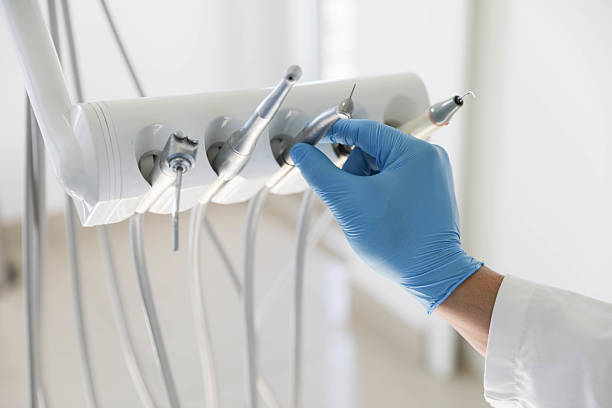 Professional Tooth Extraction technician working in Bonnetsville, NC